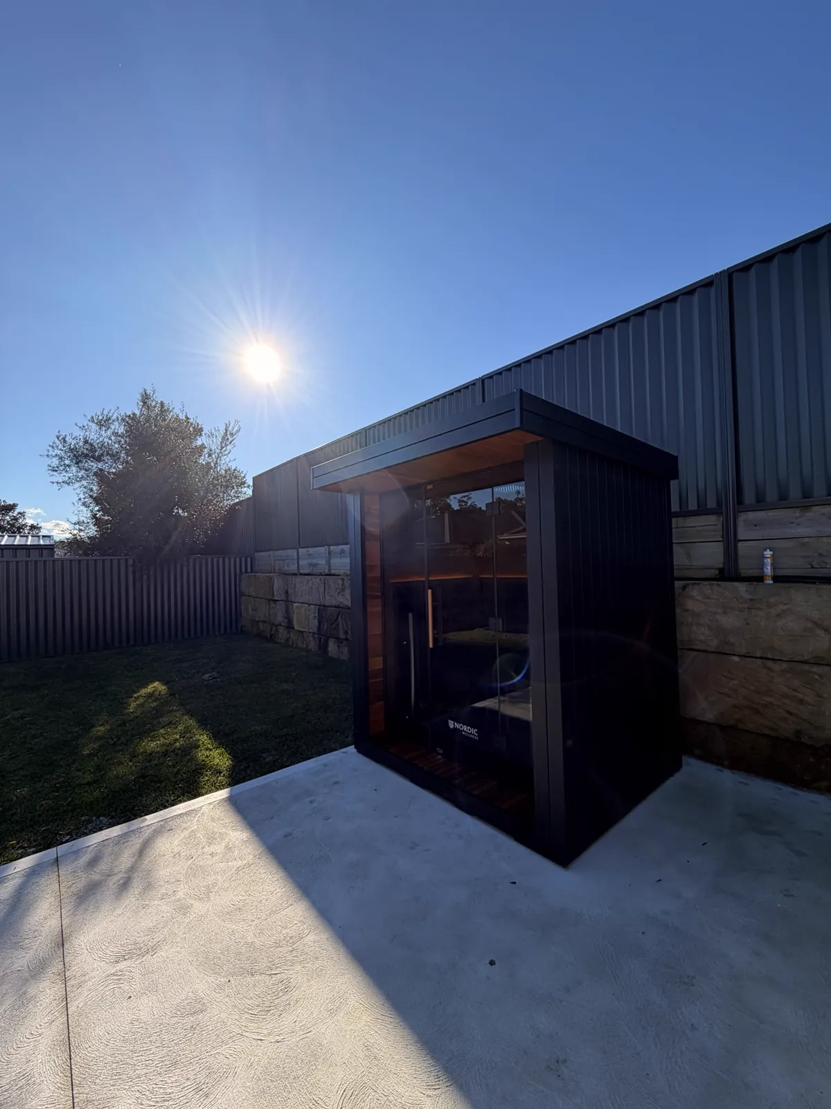 Premium black outdoor sauna on concrete slab by BuiltByAJ, Sydney